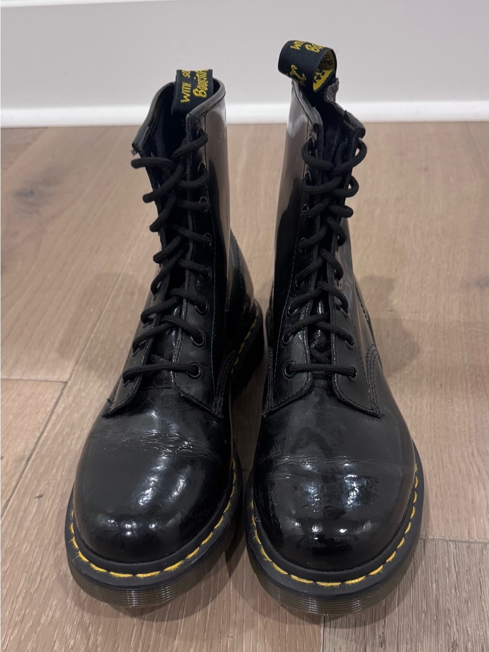 Dr. Martens Black Patent Lace-Up Boots with Yellow Stitching